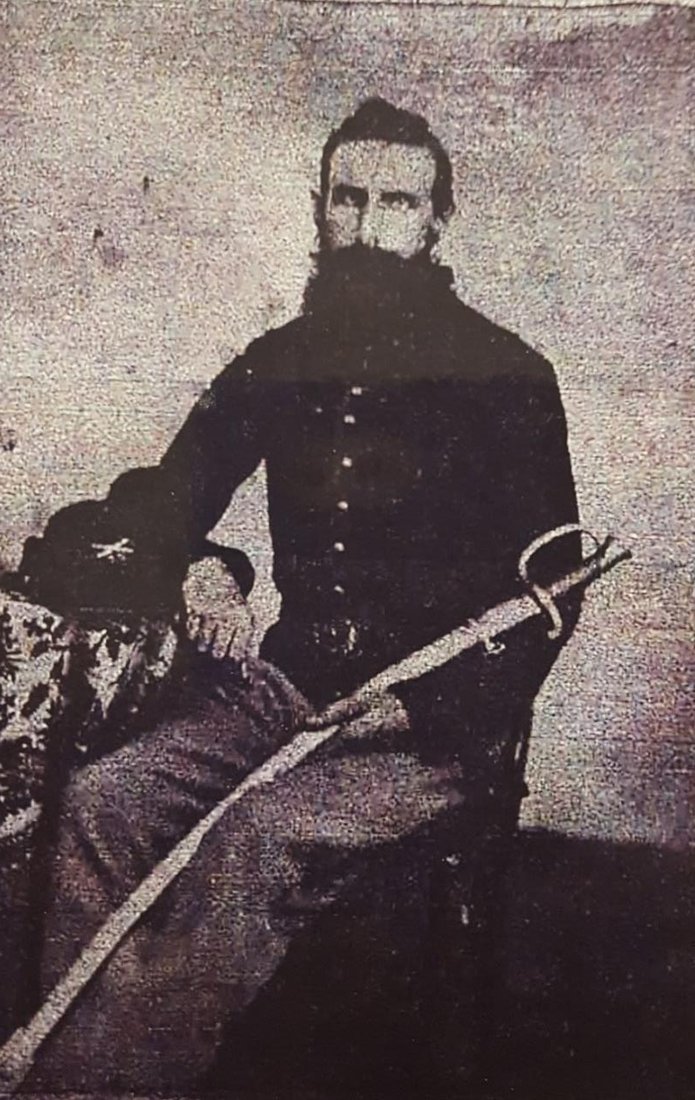 Sepia photographic portrait of a Civil War-era soldier, believed to be George Royal Comey